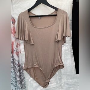 Flutter sleeve bodysuit.